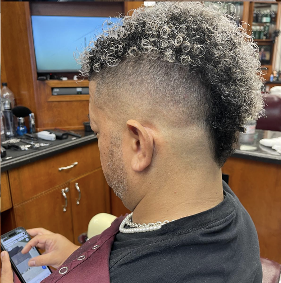 Curly Mohawk with Skin Fade